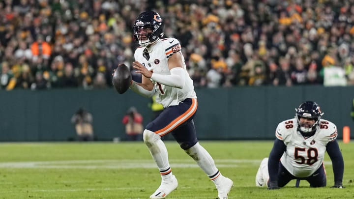 Jan 7, 2024; Green Bay, Wisconsin, USA; Chicago Bears quarterback Justin Fields (1) looks to throw a pass during the fourth quarter against the Green Bay Packers at Lambeau Field. Mandatory Credit: Jeff Hanisch-USA TODAY Sports Jan 7, 2024; Green Bay, Wisconsin, USA; Chicago Bears quarterback Justin Fields (1) looks to throw a pass during the fourth quarter against the Green Bay Packers at Lambeau Field. Mandatory Credit: Jeff Hanisch-USA TODAY Sports