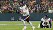 Jan 7, 2024; Green Bay, Wisconsin, USA;  Chicago Bears quarterback Justin Fields (1) looks to throw a pass during the fourth quarter against the Green Bay Packers at Lambeau Field. Mandatory Credit: Jeff Hanisch-USA TODAY Sports