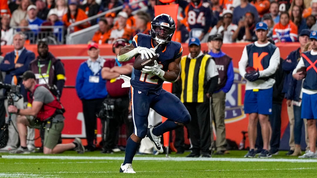 Denver Broncos running back RJ Harvey (12) catches a wide open pass for a touchdown in the fourth quarter of the NFL Week 4 Monday Night Football game between the Denver Broncos and the Cincinnati Bengals at Empower Field at Mile High in Denver on Monday, Sept. 29, 2025. The Bengals fell to 2-2 with a 28-3 loss to the Broncos.