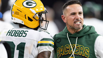 Oct 19, 2025; Glendale, Arizona, USA; Green Bay Packers head coach Matt LaFleur with cornerback Nate Hobbs (21) against the Arizona Cardinals at State Farm Stadium. ]