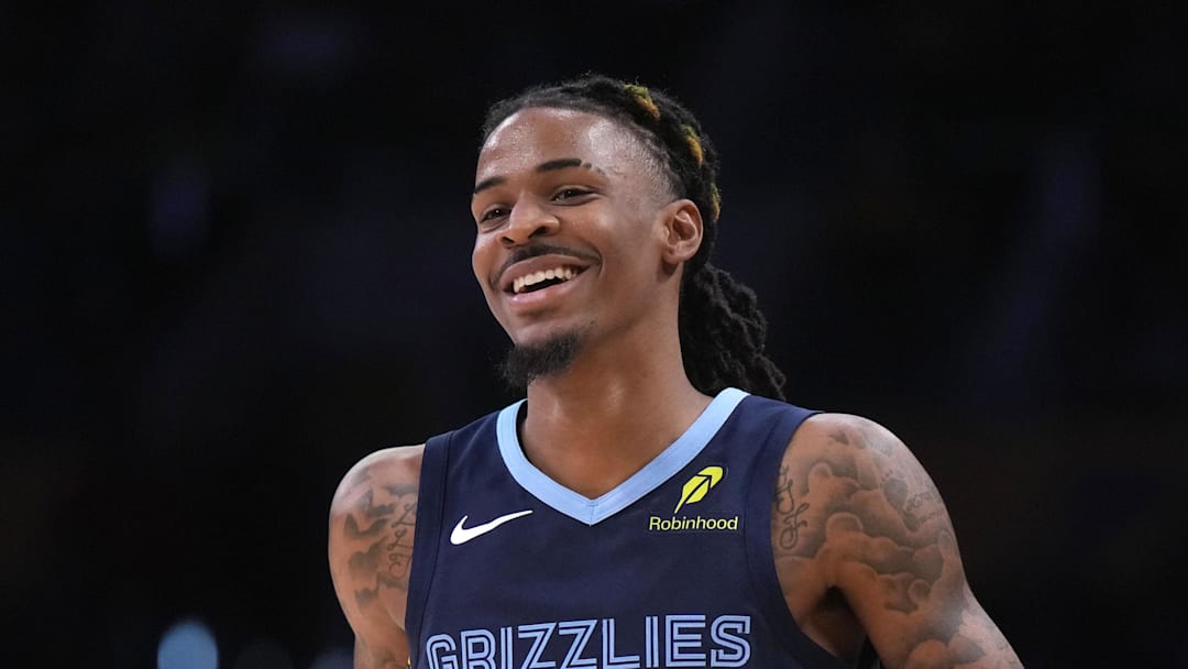 Dec 15, 2024; Los Angeles, California, USA; Memphis Grizzlies guard Ja Morant (12) reacts in the second half against the Los Angeles Lakers at Crypto.com Arena. Mandatory Credit: Kirby Lee-Imagn Images Dec 15, 2024; Los Angeles, California, USA; Memphis Grizzlies guard Ja Morant (12) reacts in the second half against the Los Angeles Lakers at Crypto.com Arena. Mandatory Credit: Kirby Lee-Imagn Images