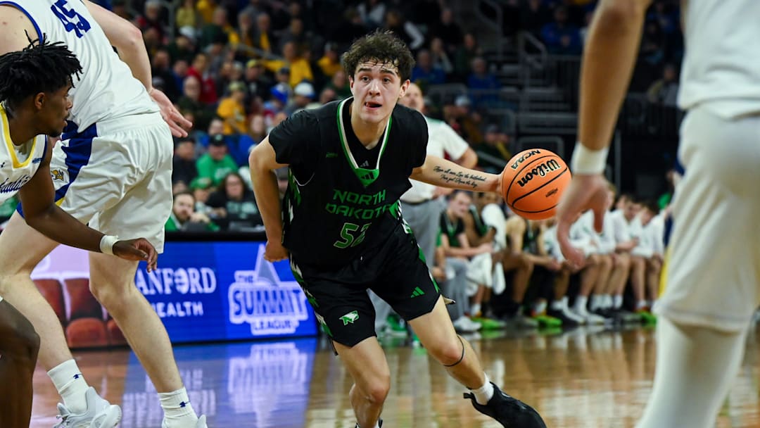 North Dakota Fighting Hawks guard Treysen Eaglestaff (52) moves the ball on Friday, March 7, 2025, at Denny Sanford Premier Center in Sioux Falls, S.D.