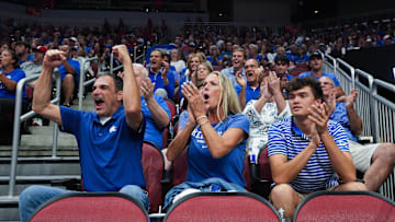 Kentucky volleyball and Nebraska volleyball fans cheered on their team during the AVCA First Serve Showcase at the KFC Yum! Center in Louisville, Ky. on Aug. 27, 2024
