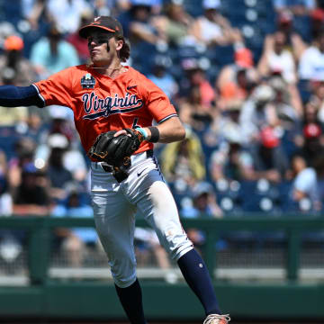 Griff O'Ferrall throws out a runner from shortstop during the Virginia baseball game vs. North Carolina at the 2024 College World Series.