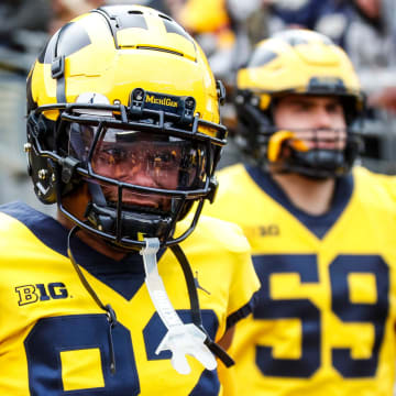 Maize Team wide receiver Semaj Morgan (82) takes the field during the spring game at Michigan Stadium in Ann Arbor on Saturday, April 20, 2024.