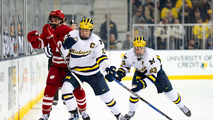 Hughes and Fantilli against Wisconsin