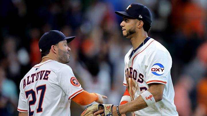 May 28, 2025; Houston, Texas, USA; Houston Astros left fielder Jose Altuve (27) and Houston Astros shortstop Jeremy Pena (3) congratulate each other after the final out against the Athletics during the ninth inning at Daikin Park. Mandatory Credit: Erik Williams-Imagn Images