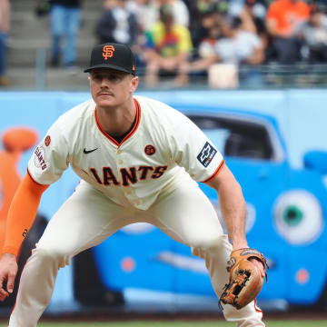 Aug 11, 2024; San Francisco, California, USA; San Francisco Giants third baseman Matt Chapman (26) squats before the pitch against the Detroit Tigers during the fourth inning at Oracle Park.