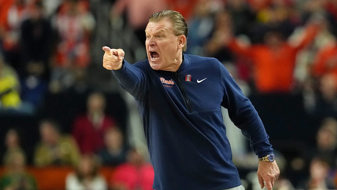 Apr 4, 2026; Indianapolis, IN, USA; Illinois Fighting Illini head coach Brad Underwood reacts after a play against the UConn Huskies during the first half of a semifinal of the Final Four of the men's 2026 NCAA Tournament at Lucas Oil Stadium. Mandatory Credit: Bob Donnan-Imagn Images