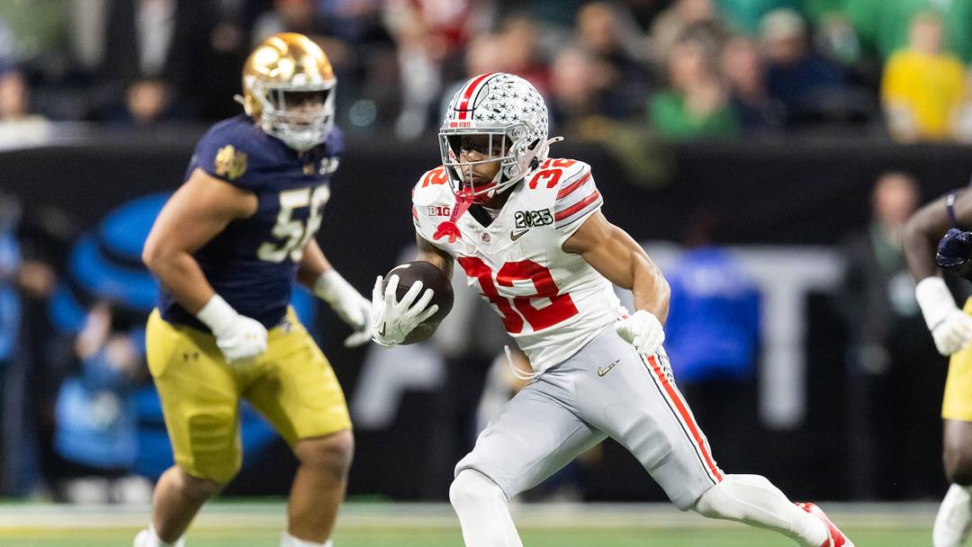 Jan 20, 2025; Atlanta, GA, USA; Ohio State Buckeyes running back TreVeyon Henderson (32) against the Notre Dame Fighting Irish during the CFP National Championship college football game at Mercedes-Benz Stadium. Mandatory Credit: Mark J. Rebilas-Imagn Images Jan 20, 2025; Atlanta, GA, USA; Ohio State Buckeyes running back TreVeyon Henderson (32) against the Notre Dame Fighting Irish during the CFP National Championship college football game at Mercedes-Benz Stadium. Mandatory Credit: Mark J. Rebilas-Imagn Images