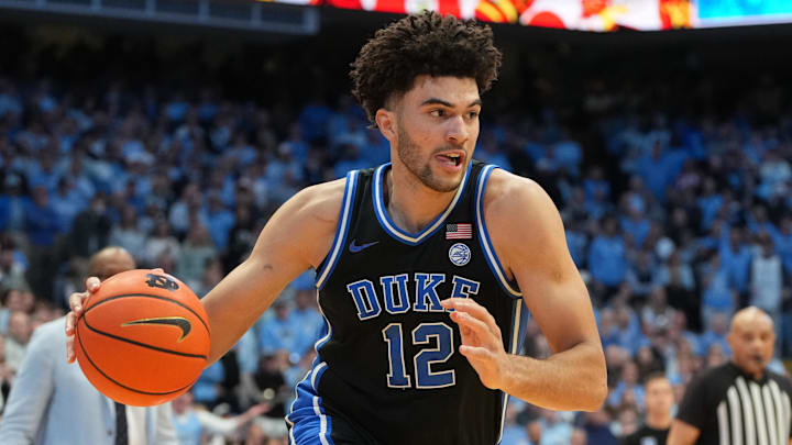 Feb 7, 2026; Chapel Hill, North Carolina, USA;  Duke Blue Devils forward Cameron Boozer (12) dribbles in the first half at Dean E. Smith Center.
