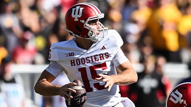 dante moore fernando mendoza oregon ducks indiana hoosiers dan lanning transfer portal quarterback nfl draft heisman big ten