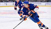 Oct 26, 2024; Elmont, New York, USA;  New York Islanders center Mathew Barzal (13) skates with the puck against the Florida Panthers during the second period at UBS Arena. Mandatory Credit: Dennis Schneidler-Imagn Images