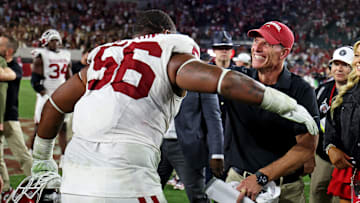Oklahoma head coach Brent Venables celebrates with defensive lineman Gracen Halton after beating Alabama.