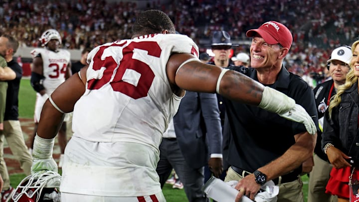 Oklahoma head coach Brent Venables celebrates with defensive lineman Gracen Halton after beating Alabama.