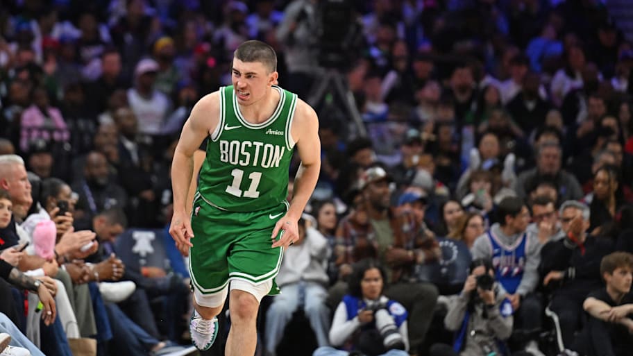 Boston Celtics guard Payton Pritchard reacts after making a three point basket against the Philadelphia 76ers.
