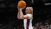 TCU Horned Frogs guard Hailey Van Lith shoots the ball against the West Virginia Mountaineers.