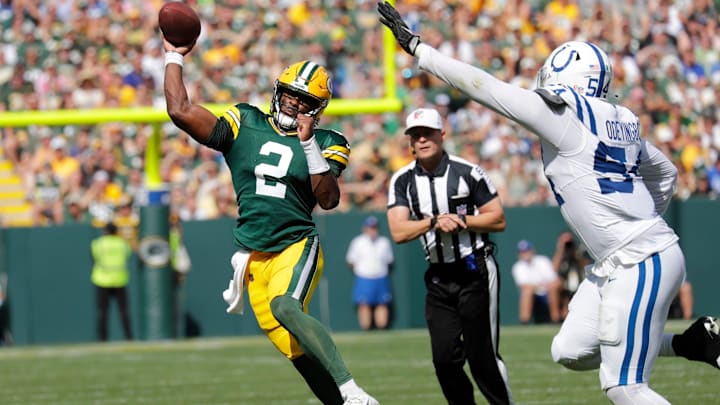 Green Bay Packers quarterback Malik Willis (2) throws a pass against Indianapolis Colts defensive end Dayo Odeyingbo (54) during their football game Sunday, September 15, 2024, at Lambeau Field in Green Bay, Wisconsin.