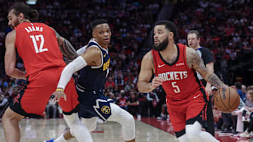 Apr 13, 2025; Houston, Texas, USA; Houston Rockets center Steven Adams (12) picks Denver Nuggets guard Russell Westbrook (4) as Houston Rockets guard Fred VanVleet (5) dribbles against Westbrook in the second quarter  at Toyota Center. Mandatory Credit: Thomas Shea-Imagn Images