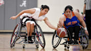 Mar 11, 2023; Tuscaloosa, AL, USA;  UT Arlington's Denise Rodriguez (33) and Alabama's Ixhelt Gonzalez (54) work to grab a loose ball. The Crimson Tide defeated UT-Arlington 88-41 to claim the team's 9th national championship