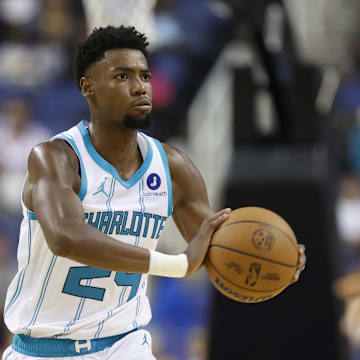 Oct 15, 2025; Greensboro, North Carolina, USA; Charlotte Hornets forward Brandon Miller (24) passes the ball against the Memphis Grizzlies in the first half at First Horizon Coliseum. Mandatory Credit: Brian Westerholt-Imagn Images