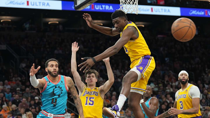 Nov 22, 2022; Phoenix, Arizona, USA; Phoenix Suns guard Duane Washington Jr. (4) passes the ball by Los Angeles Lakers forward Troy Brown Jr. (7) by during the second half at Footprint Center. Mandatory Credit: Joe Camporeale-Imagn Images Nov 22, 2022; Phoenix, Arizona, USA; Phoenix Suns guard Duane Washington Jr. (4) passes the ball by Los Angeles Lakers forward Troy Brown Jr. (7) by during the second half at Footprint Center. Mandatory Credit: Joe Camporeale-Imagn Images