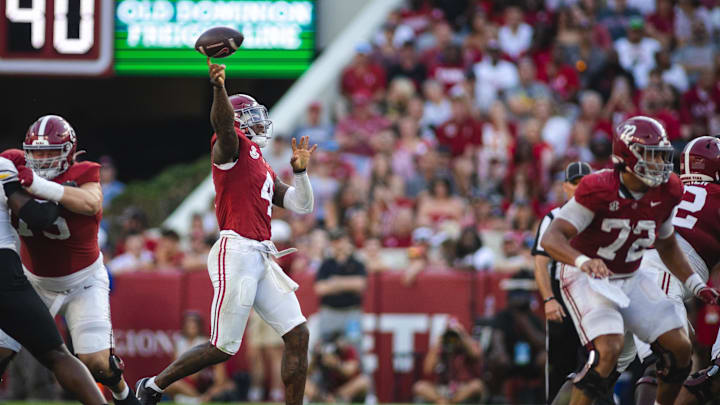 Alabama quarterback Jalen Milroe attempts a pass for the Crimson Tide.