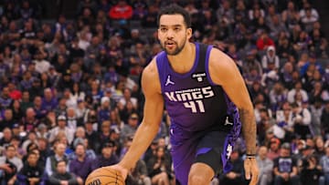 Jan 2, 2024; Sacramento, California, USA; Sacramento Kings forward Trey Lyles (41) controls the ball against the Charlotte Hornets during the first quarter at Golden 1 Center. Mandatory Credit: Kelley L Cox-Imagn Images