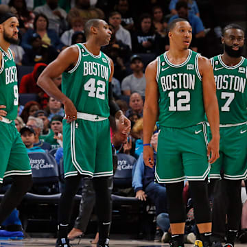 Nov 7, 2022; Memphis, Tennessee, USA; Boston Celtics guard Marcus Smart (36), guard Derrick White (9), center Al Horford (42), forward Grant Williams (12) and guard Jaylen Brown (7) during the second half against the Memphis Grizzlies at FedExForum. Mandatory Credit: Petre Thomas-Imagn Images