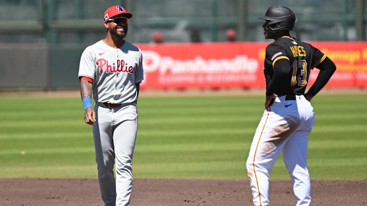 Mar 18, 2025; Bradenton, Florida, USA; Pittsburgh Pirates third baseman KeíBryan Hayes (13) and Philadelphia Phillies shortstop Edmundo Sosa (33) talk in between pitches  in the third  inning during spring training at LECOM Park. Mandatory Credit: Jonathan Dyer-Imagn Images