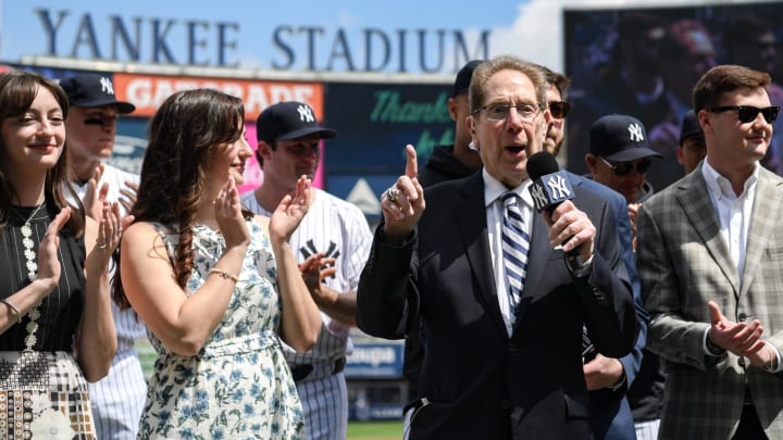 Apr 20, 2024; Bronx, New York, USA; Longtime Yankee announcer John Sterling is honored during a pregame ceremony in recognition of his retirement before a game against the Toronto Blue Jays at Yankee Stadium. Mandatory Credit: John Jones-USA TODAY Sports