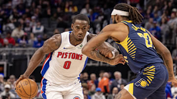 Nov 17, 2025; Detroit, Michigan, USA; Indiana Pacers forward Isaiah Jackson (22) defends against Detroit Pistons center Jalen Duren (0) during the first quarter at Little Caesars Arena. Mandatory Credit: David Reginek-Imagn Images