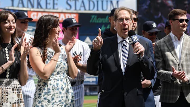 Apr 20, 2024; Bronx, New York, USA; Longtime Yankee announcer John Sterling is honored during a pregame ceremony in recognition of his retirement before a game against the Toronto Blue Jays at Yankee Stadium. Mandatory Credit: John Jones-Imagn Images