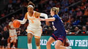 Tennessee forward Janiah Barker (0) dribbles the ball in front of Belmont guard Quinn Eubank (22) during a NCAA women's basketball between the Tennessee Lady Vols and Belmont Bruins at Thompson-Boling Arena at Food City Center in Knoxville, Tenn. on Nov. 13, 2025.
