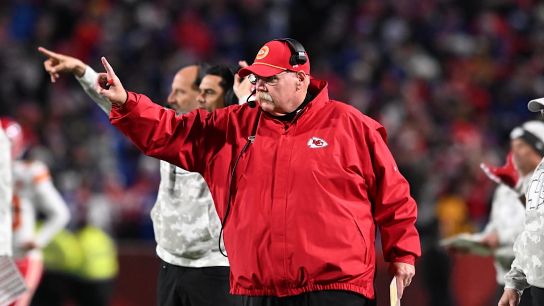 Nov 17, 2024; Orchard Park, New York, USA; Kansas City Chiefs head coach Andy Reid signals to go for one point after a touchdown  against the Buffalo Bills in the fourth quarter at Highmark Stadium. Mandatory Credit: Mark Konezny-Imagn Images