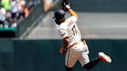 May 18, 2025; San Francisco, California, USA; San Francisco Giants outfielder Heliot Ramos (17) rounds the bases after hitting a solo home run during the first inning against the Oakland Athletics at Oracle Park.