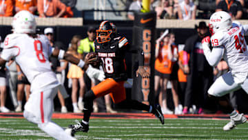 Oklahoma State Cowboys quarterback Sam Jackson V (18) runs during a college football game between the Oklahoma State Cowboys (OSU) and the Houston Cougars at Boone Pickens Stadium in Stillwater, Okla., Saturday, Oct. 11, 2025.