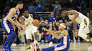 Nov 3, 2017; Philadelphia, PA, USA; Philadelphia 76ers guard Jerryd Bayless (0) passes the ball to 76ers guard Ben Simmons (25) in front of Indiana Pacers forward Thaddeus Young (21) and guard Victor Oladipo (4) during the fourth quarter at Wells Fargo Center. Mandatory Credit: Bill Streicher-Imagn Images