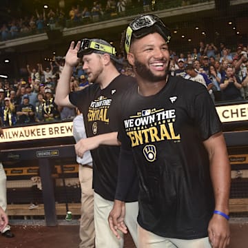 Sep 18, 2024; Milwaukee, Wisconsin, USA; Milwaukee Brewers left fielder Jackson Chourio (11) celebrates after the Brewers won NL Central Division at American Family Field.