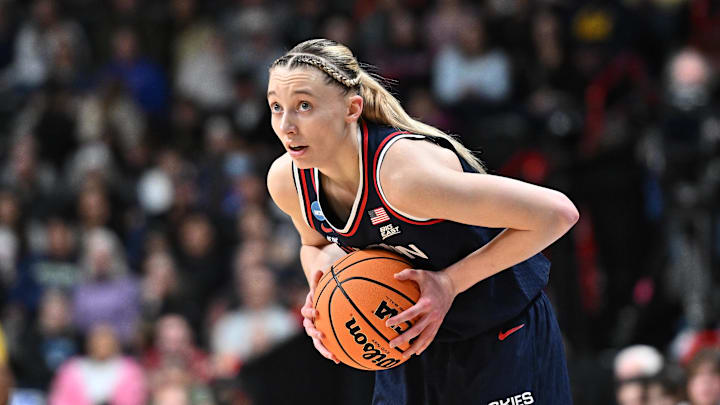 The UConn Huskies and guard Paige Bueckers are favored to win it all. The UConn Huskies and guard Paige Bueckers are favored to win it all.