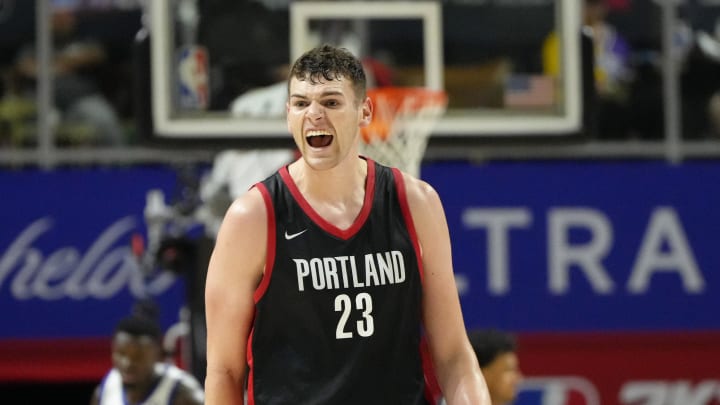 Jul 15, 2024; Las Vegas, NV, USA; Portland Trail Blazers center Donovan Clingan (23) reacts to a play against the Philadelphia 76ers during the second half at Thomas & Mack Center. Mandatory Credit: Lucas Peltier-USA TODAY Sports