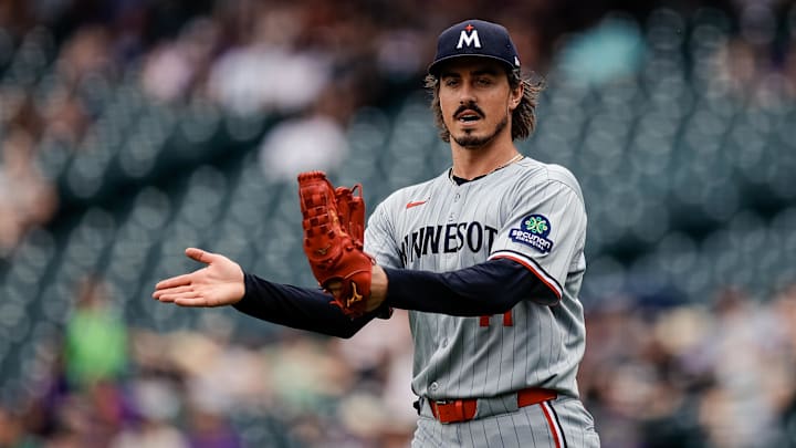 Jul 20, 2025; Denver, Colorado, USA; Minnesota Twins starting pitcher Joe Ryan (41) reacts after a play in the first inning against the Colorado Rockies at Coors Field. Mandatory Credit: Isaiah J. Downing-Imagn Images
