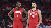 Oct 24, 2025; Houston, Texas, USA; Houston Rockets forward Kevin Durant (7) talks with center Alperen Sengun (28) during the first quarter against the Detroit Pistons at Toyota Center. Mandatory Credit: Troy Taormina-Imagn Images