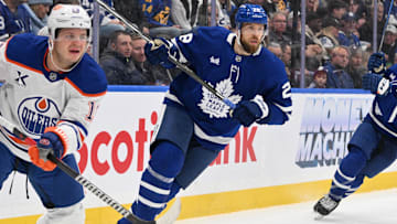 Nov 16, 2024; Toronto, Ontario, CAN;  Toronto Maple Leafs defenseman Jani Hakanpaa (28) pursues the play against the Edmonton Oilers in the second period at Scotiabank Arena. Mandatory Credit: Dan Hamilton-Imagn Images