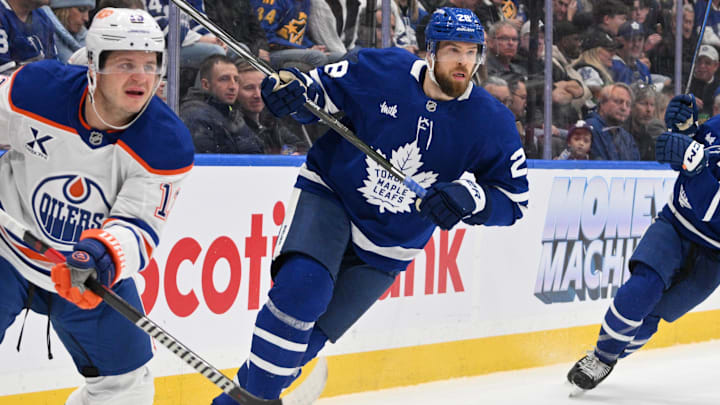 Nov 16, 2024; Toronto, Ontario, CAN;  Toronto Maple Leafs defenseman Jani Hakanpaa (28) pursues the play against the Edmonton Oilers in the second period at Scotiabank Arena. Mandatory Credit: Dan Hamilton-Imagn Images