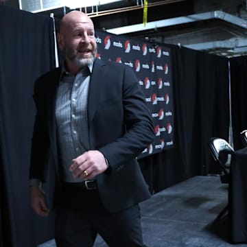 Apr 13, 2025; Portland, Oregon, USA: Portland Trail Blazers general manager Joe Cronin departs the presser before the Trail Blazers play Los Angeles Lakers at Moda Center. Mandatory Credit: Jaime Valdez-Imagn Images