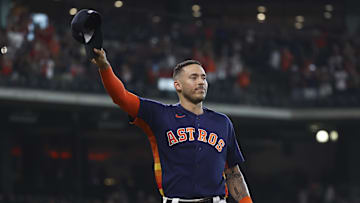 Oct 3, 2021; Houston, Texas, USA; Houston Astros shortstop Carlos Correa (1) waves to the crowd after coming off the field before the ninth inning against the Oakland Athletics at Minute Maid Park. Mandatory Credit: Troy Taormina-Imagn Images