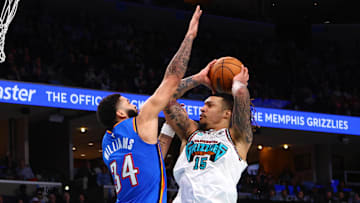 Feb 8, 2025; Memphis, Tennessee, USA; Memphis Grizzlies forward Brandon Clarke (15) drives to the basket as Oklahoma City Thunder forward Kenrich Williams (34) defends during the third quarter at FedExForum. Mandatory Credit: Petre Thomas-Imagn Images