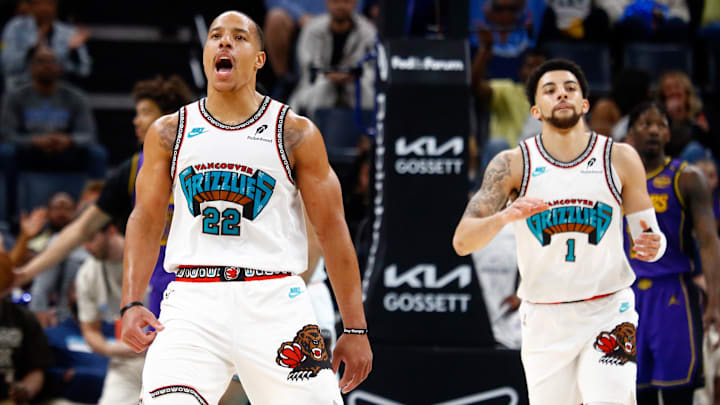 Mar 29, 2025; Memphis, Tennessee, USA; Memphis Grizzlies guard Desmond Bane (22) and guard Scotty Pippen Jr. (1) react during the second quarter against the Los Angeles Lakers at FedExForum. Mandatory Credit: Petre Thomas-Imagn Images