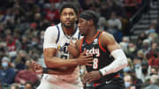 Dec 29, 2021; Portland, Oregon, USA; Utah Jazz forward Rudy Gay (8) and Portland Trail Blazers forward Cameron McGriff (8) jockey for position during the second half at Moda Center. The Jazz won the game 120-105. Mandatory Credit: Troy Wayrynen-USA TODAY Sports
